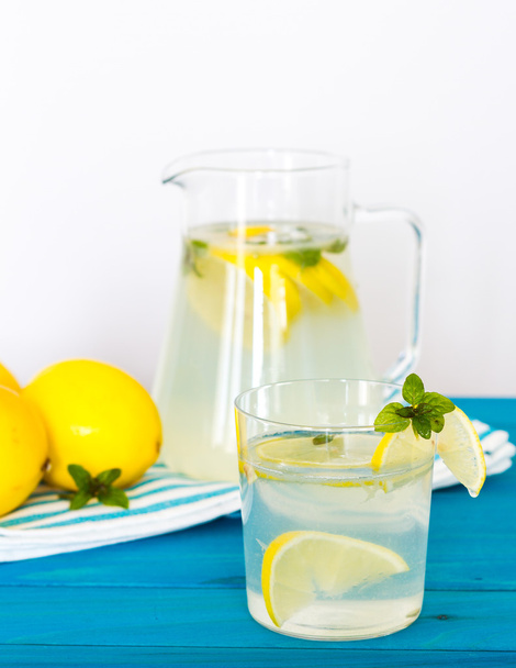 Bottle of fresh drink with lemon and mint flavour, juice - 写真・画像
