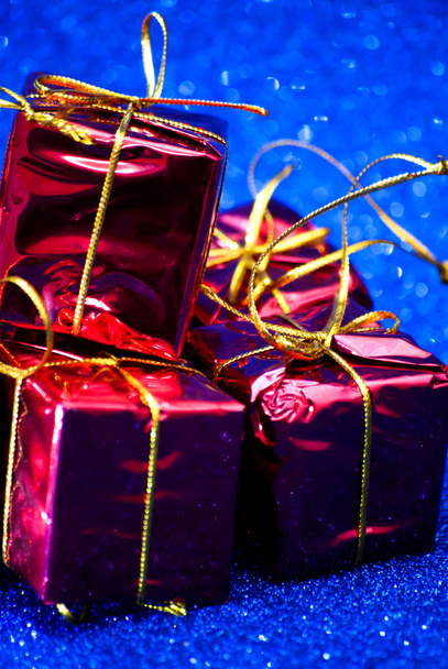 Gift packages on bright blue background - Foto, Imagem