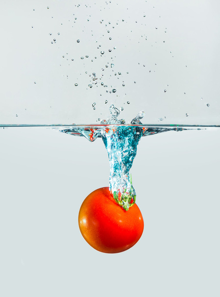 tomato splash in water - Photo, image