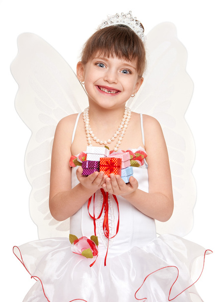 загублена дитина, одягнена як зубна фея з подарунками
 - Фото, зображення