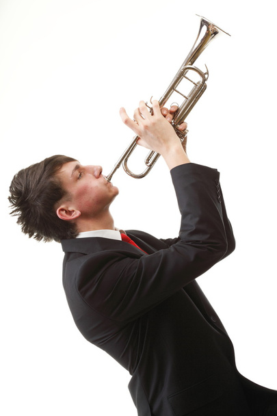 Portrait of a young man playing his Trumpet - Fotografie, Obrázek