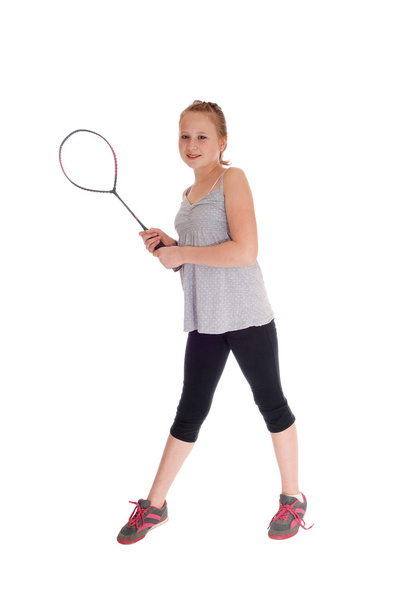 Young blond girl with her tennis racquet. - Foto, Imagen