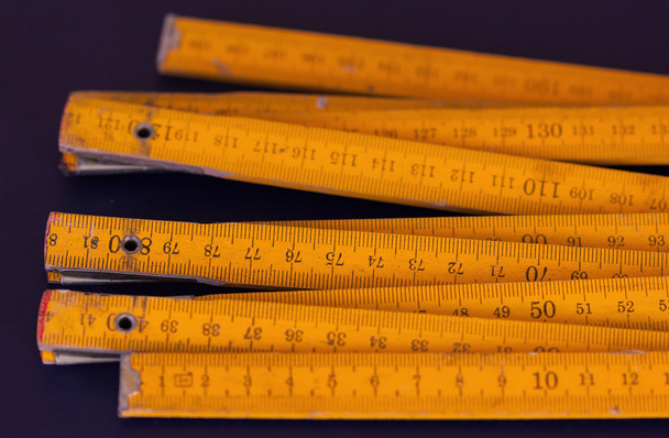 Old yellow rulers with sections - Photo, Image