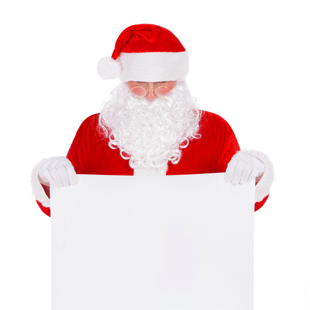 Santa Claus with empty poster - Фото, зображення