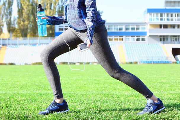 Sports woman legs - Foto, Imagen
