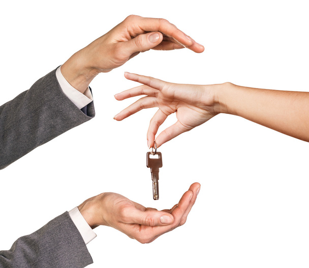 Hand giving a key - Photo, Image