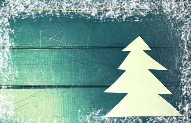 Papier-Weihnachtsbaum auf blauem Holzhintergrund. frohes neues Jahr - Foto, Bild