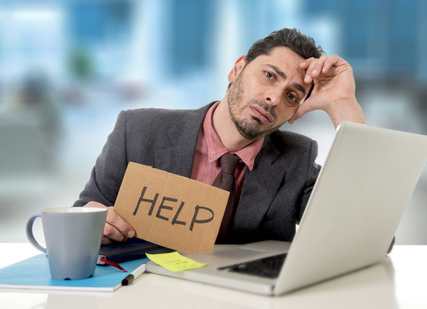 sad businessman at office desk working on computer laptop asking for help depressed - Photo, Image