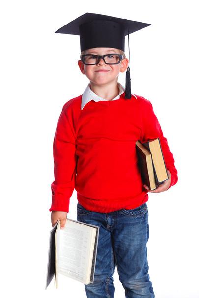 Little boy in academic hat - Фото, изображение