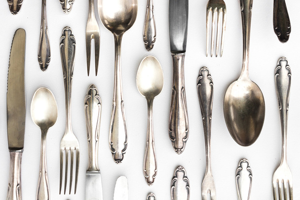 beautiful sterling cutlery set on white background - 写真・画像