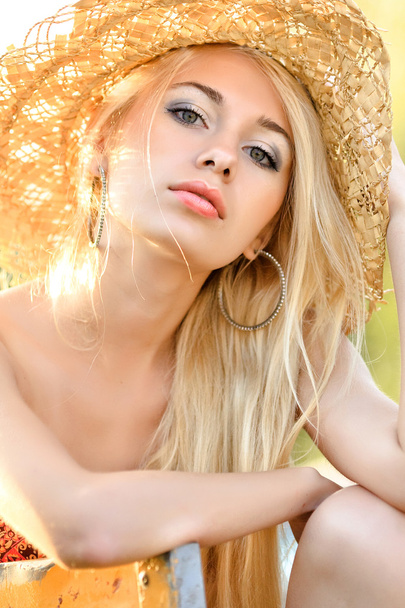 Portrait of a beautiful girl on a summer evening sun - Photo, image
