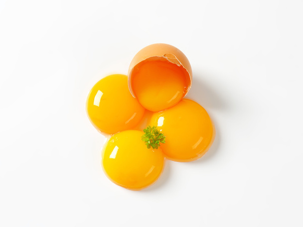 Raw egg yolks - Foto, Imagen