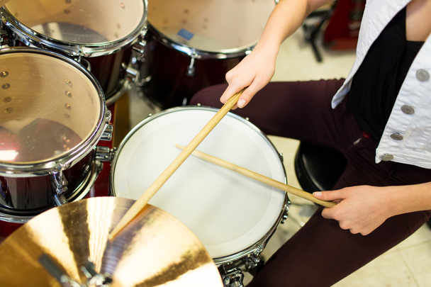 close up of musician playing cymbals on drum kit - Photo, image