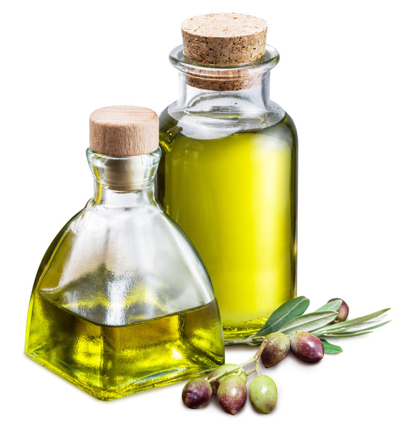 Olive oil and berries on a white background. - Valokuva, kuva
