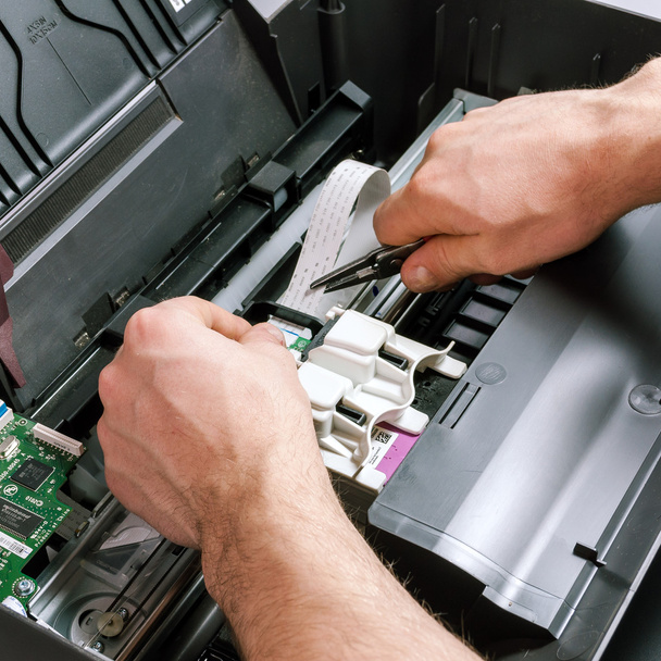 Mantenimiento y reparación de la impresora
 - Foto, Imagen