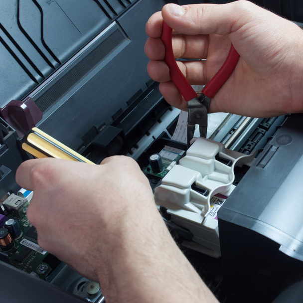 Maintenance and repair of the printer - Photo, Image
