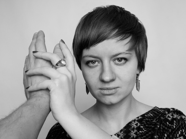 Domestic violence - woman stops husband's agression - Φωτογραφία, εικόνα