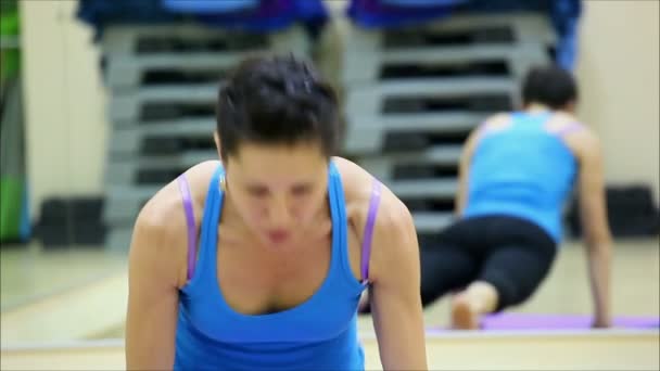 Beautiful girl in a gym - Filmati, video