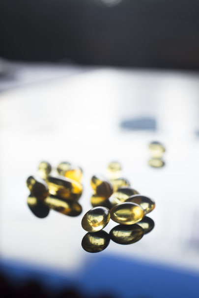 Fish oil capsules health food supplement - Photo, Image