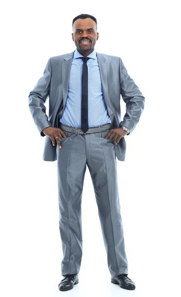Full length portrait of a happy businessman standing against isolated white background - Photo, Image