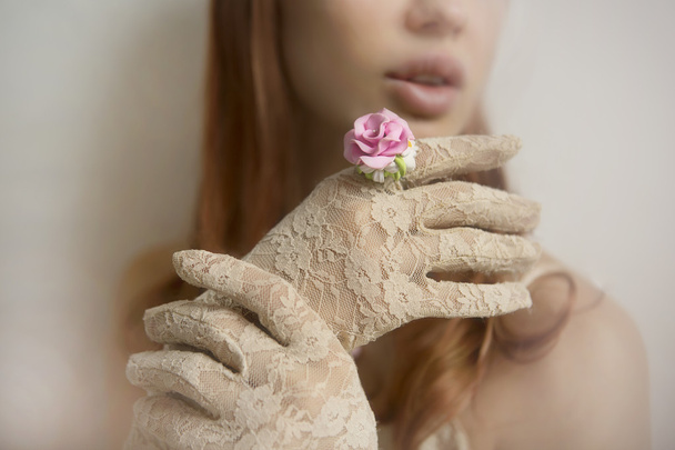 Romantic vintage style: Fashion studio shot of Female hand in la - Photo, image