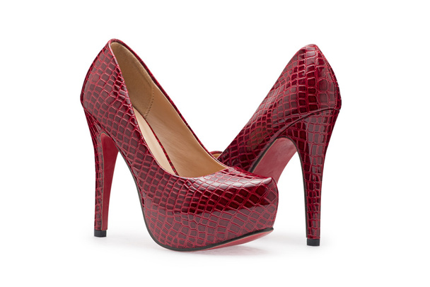 Red high heels, symbolic photo for fashion and elegance - Photo, Image