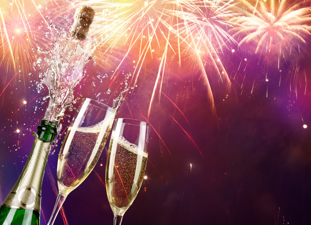 Champagne And Bottle With Fireworks - 写真・画像