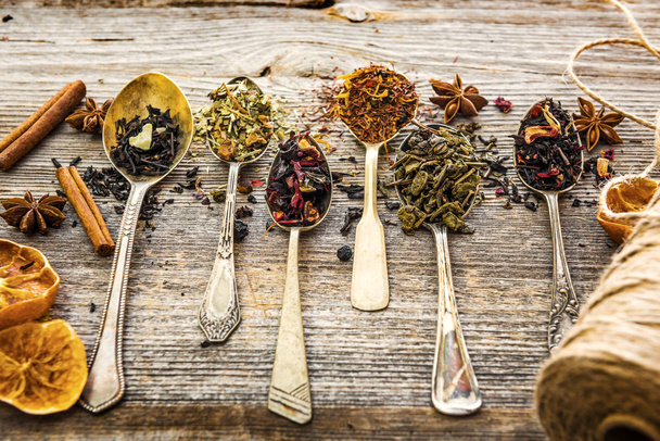 dry teas on wooden background - Photo, image