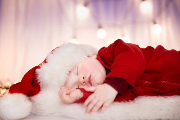 Cute baby santa sleeping - Foto, imagen