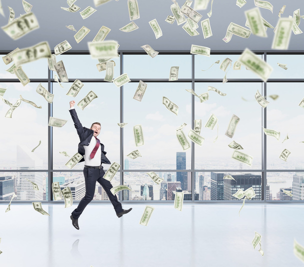 businessman jumping, money rain - Photo, image
