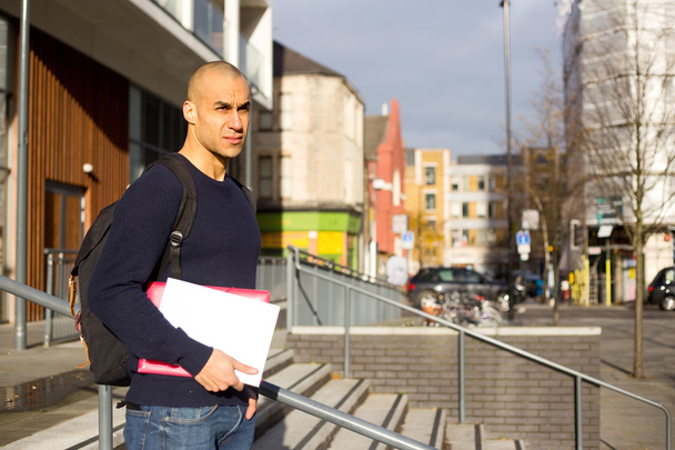 college student holding textbooks - Foto, imagen