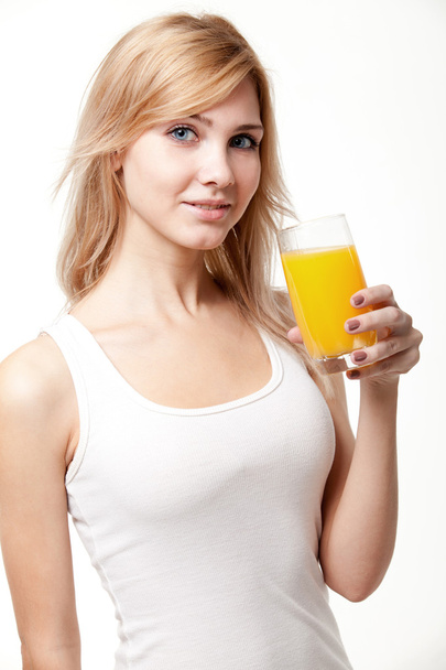 Young woman with orange juice - Foto, imagen