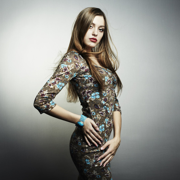Fashion portrait of young beautiful woman - 写真・画像