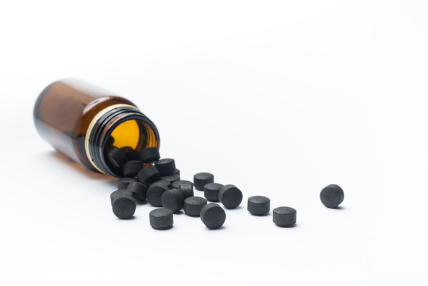 Activated carbon pills - Photo, Image