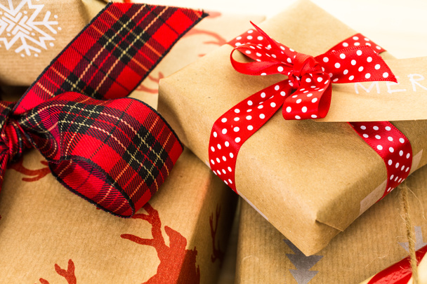 Christmas gifts wrapped in brown paper - Photo, Image