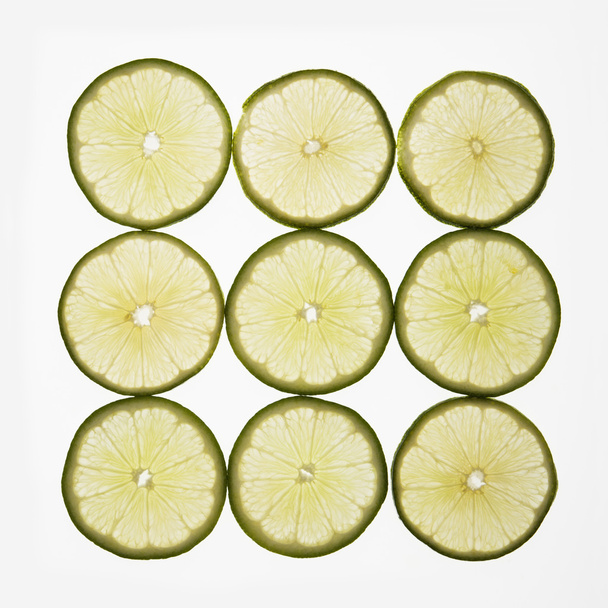 Lime slices. - Foto, afbeelding