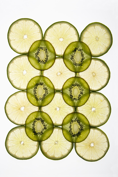 Kiwi and lime. - Фото, изображение