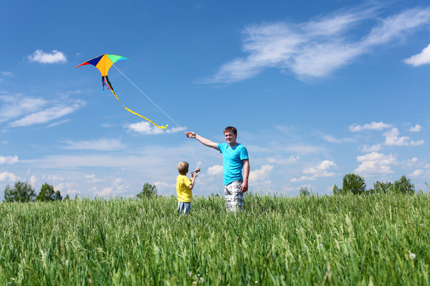Father with son in summer with kite - Zdjęcie, obraz
