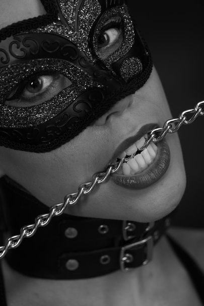 Women in mask and chain - Φωτογραφία, εικόνα