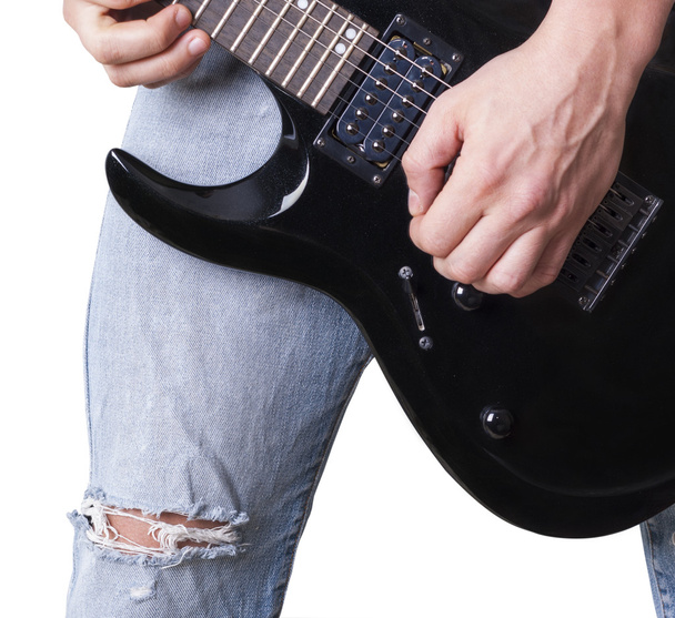 электрогитара и джинсы
 - Фото, изображение