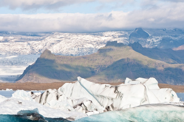 ледниковое озеро в Исландии - анацистские формы, созданные глобальным потеплением
 - Фото, изображение