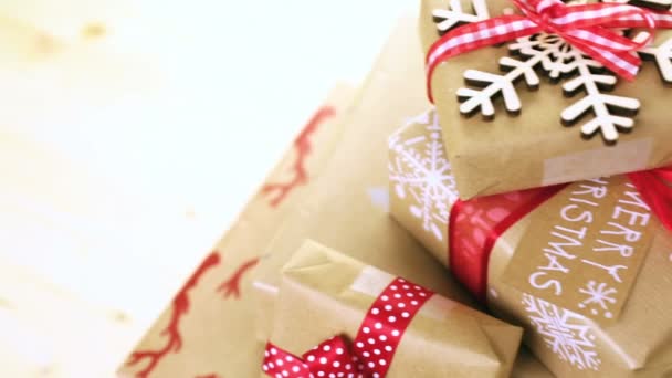 Christmas gifts wrapped in brown paper - Footage, Video