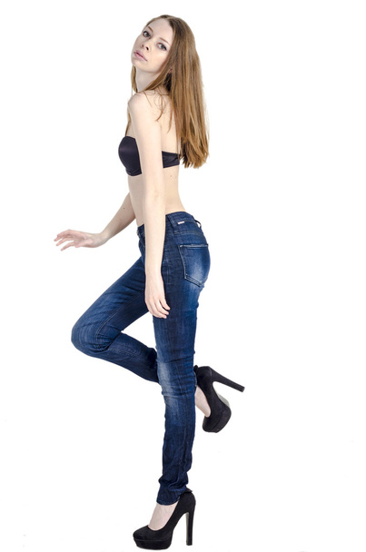 Slim blonde girl in jeans and bra - Foto, Imagem