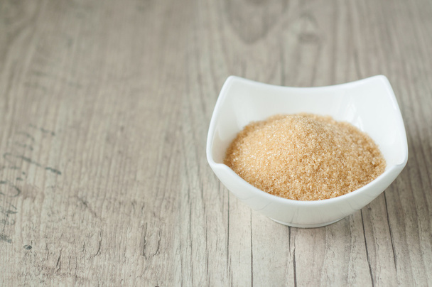 cane brown sugar in white bowl  - Photo, Image