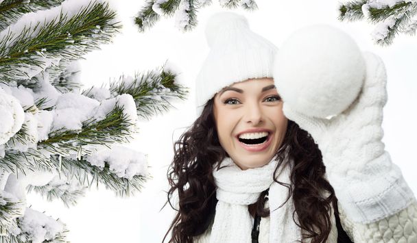 woman winter portrait chistmas tree covered with snow - Foto, imagen