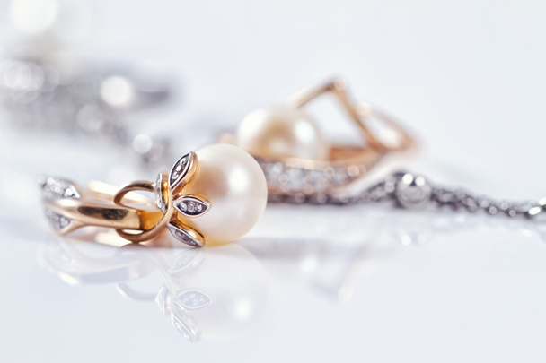 Beautiful gold earring with pearl - Photo, Image