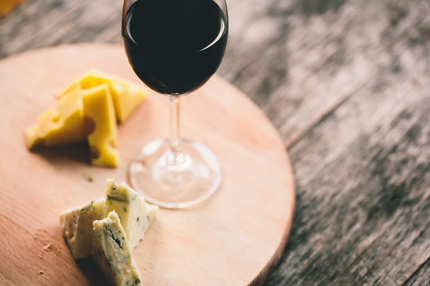 Cheese and glass of wine - Photo, Image