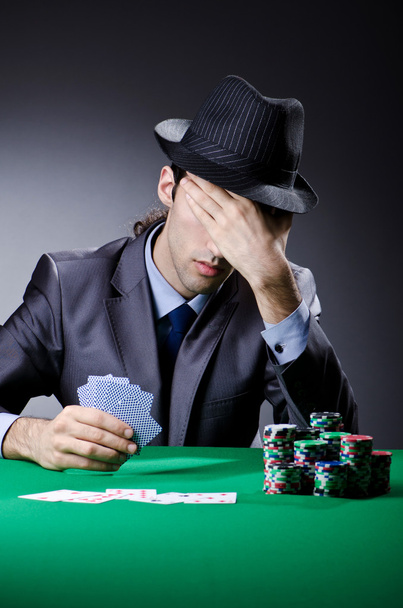 Casino player playing with chips - 写真・画像