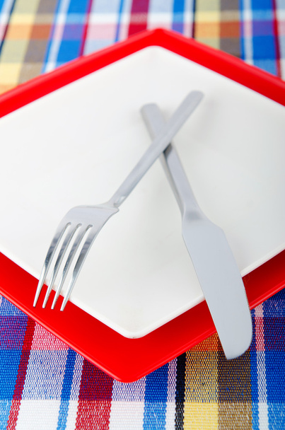Empty plate with utensils - Фото, изображение