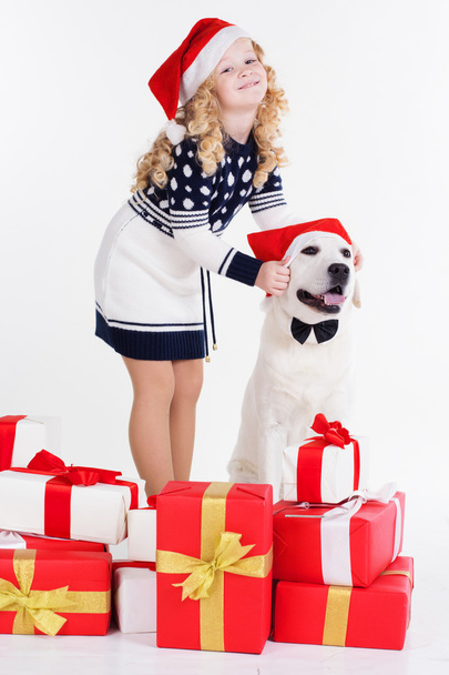 Girl with dog, christmas concept - Foto, afbeelding